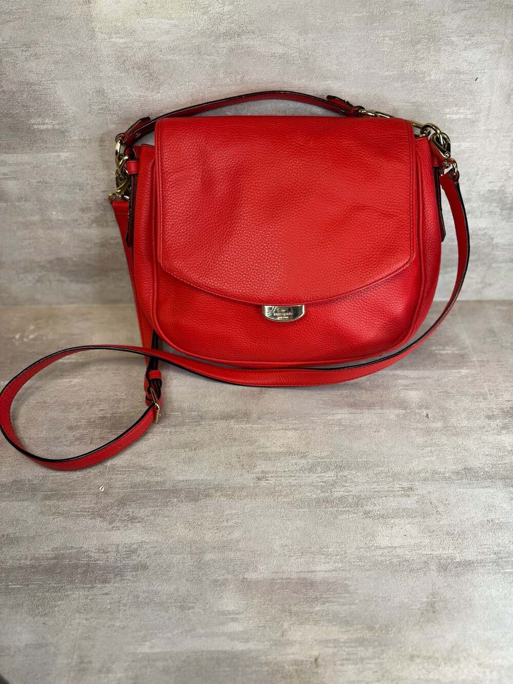 Kate Spade New York Pebble Leather Saddle Crossbody Bag in Red